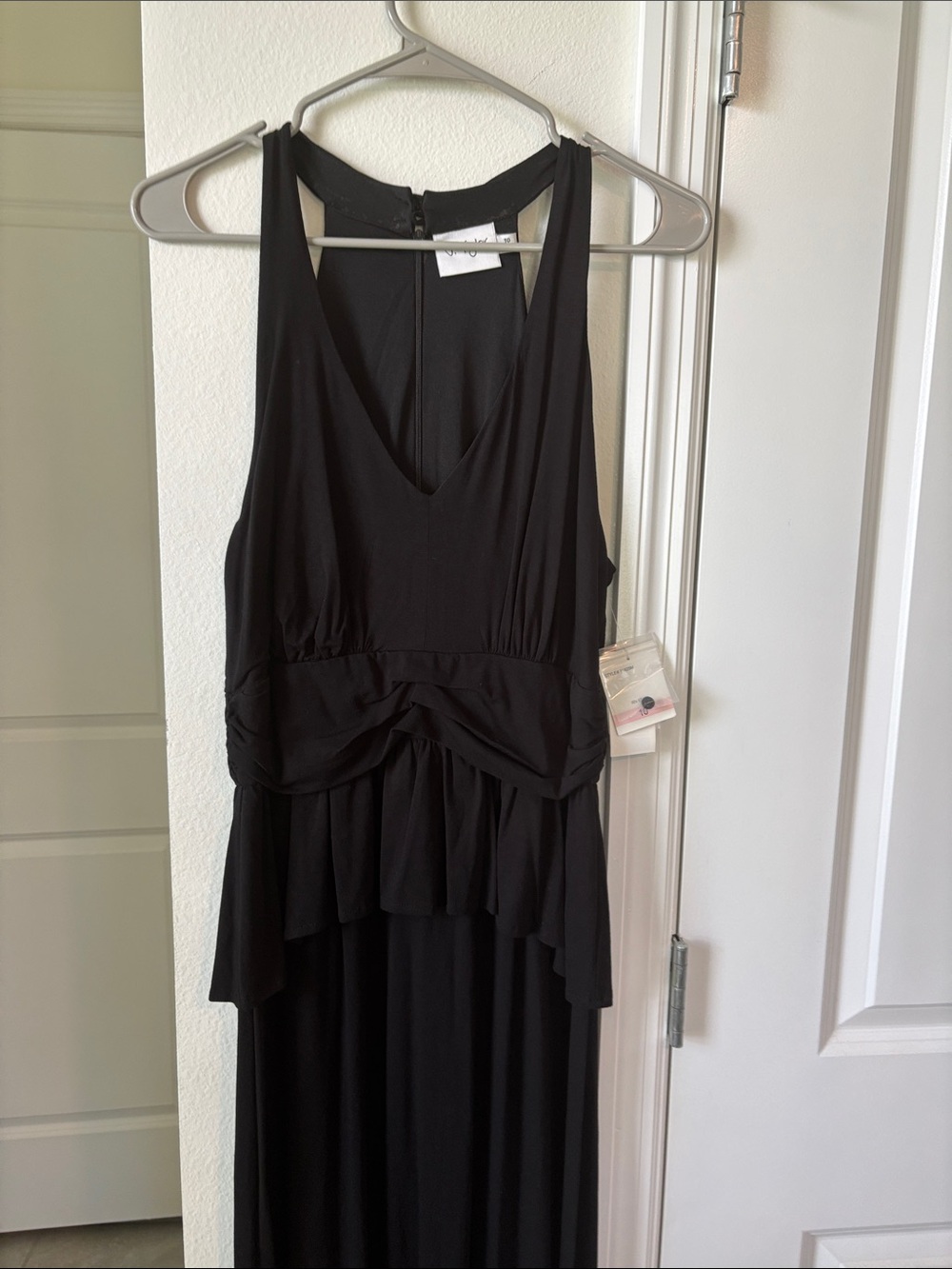 Sleek Black Sleeveless Maxi Dress with Peplum Detail - Picture 2 of 5